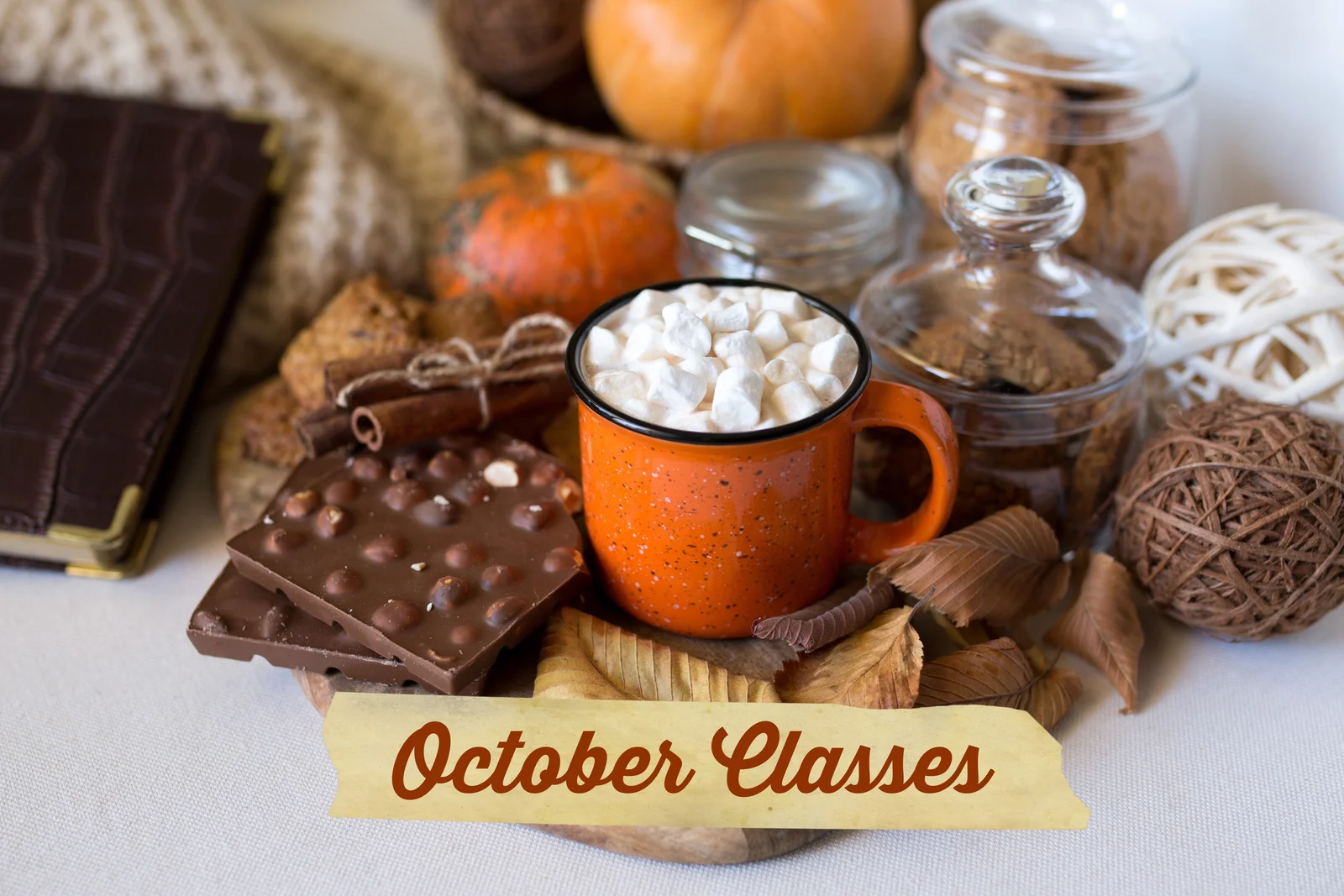 October Classes banner with hot cocoa, autumn leaves, pumpkins and chocolate